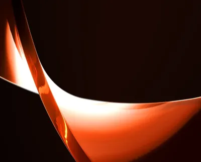 Puntus Keyvisual – die Tilde. Eine dynamsche abstrakte Form in orange Tönen
